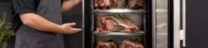 Beef aging inside a commercial dry age refrigerator